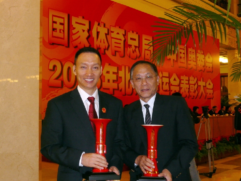 PolyU duo receives special awards for contribution to Beijing Olympics