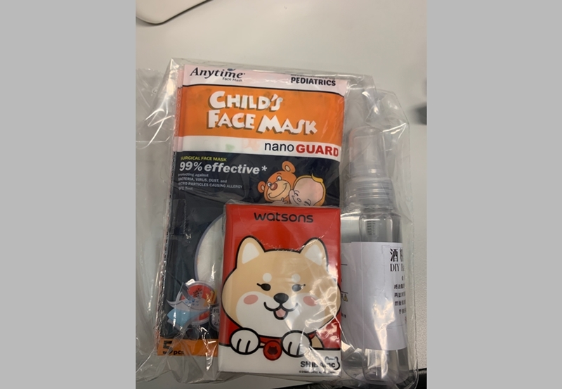 Charity care packages containing masks, hand sanitiser and tissues