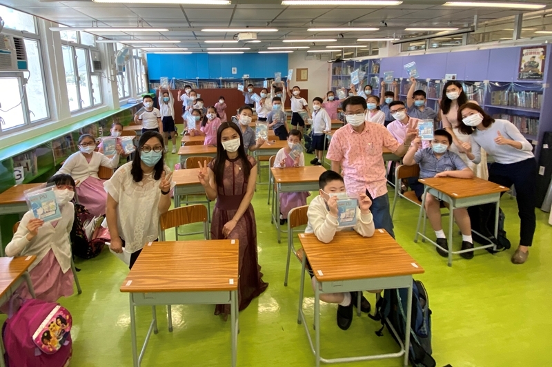 Educating and donating face masks to students of a primary school