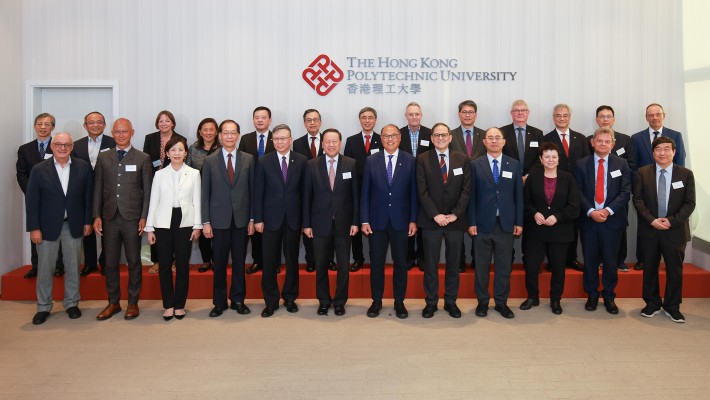 Dr Lam Tai-fai, PolyU Council Chairman (6th from right, front row); Prof. Jin-Guang Teng, President (5th from left, front row); and other members of the University management welcomed the delegation led by Mr Tim Lui, Chairman of UGC (6th from left, front row) for their PolyU campus visit. Members of the University management included Prof. Wing-tak Wong, Deputy President and Provost (4th from right, front row); Dr Miranda Lou, Executive Vice President (3rd from left, front row) and senior management.